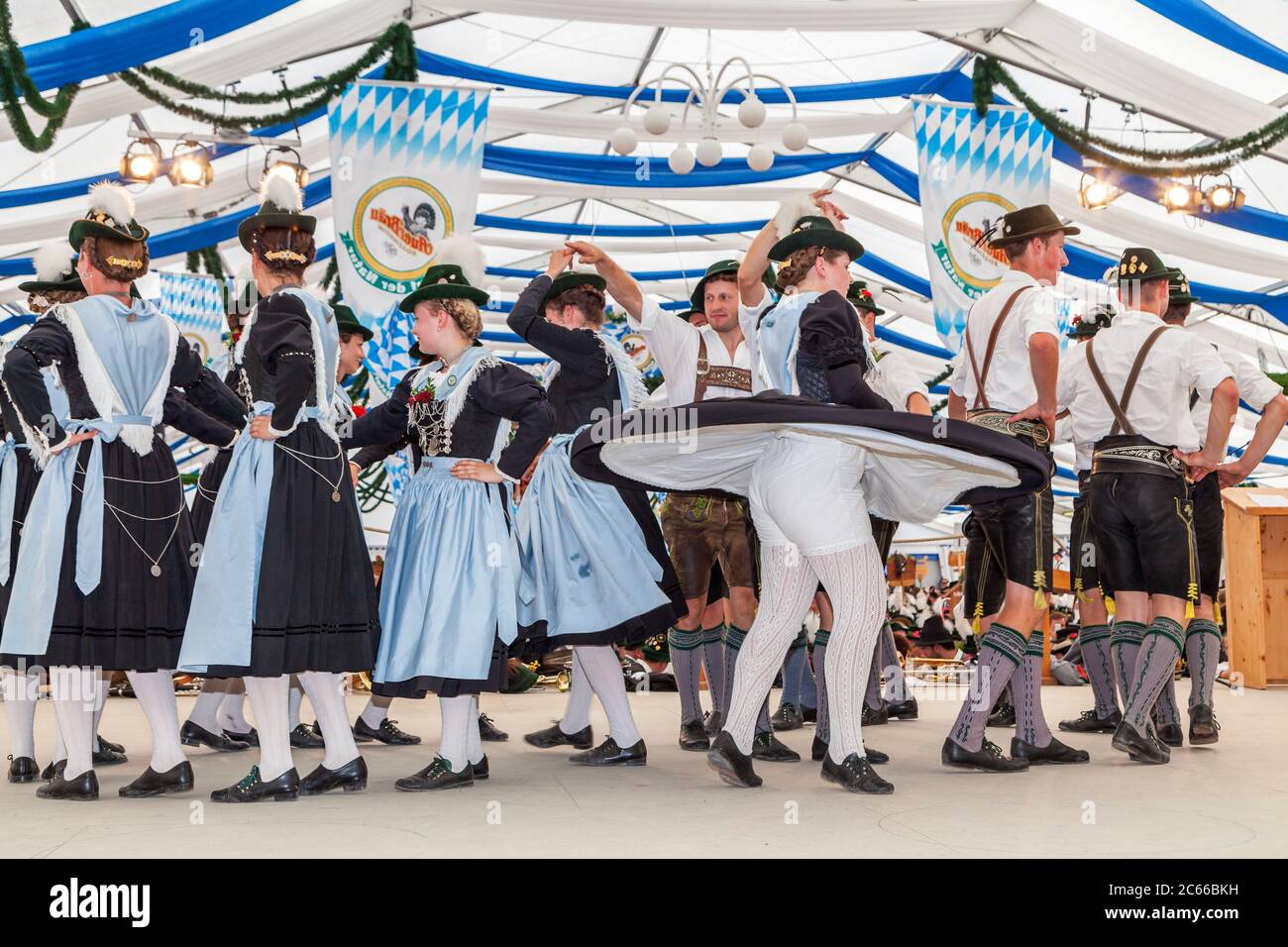 Marquee with traditional men and women in Rosenheim for the Gaufest of Gauverband I, Upper Bavaria, Bavaria, Southern Germany, Germany, Europe Stock Photo