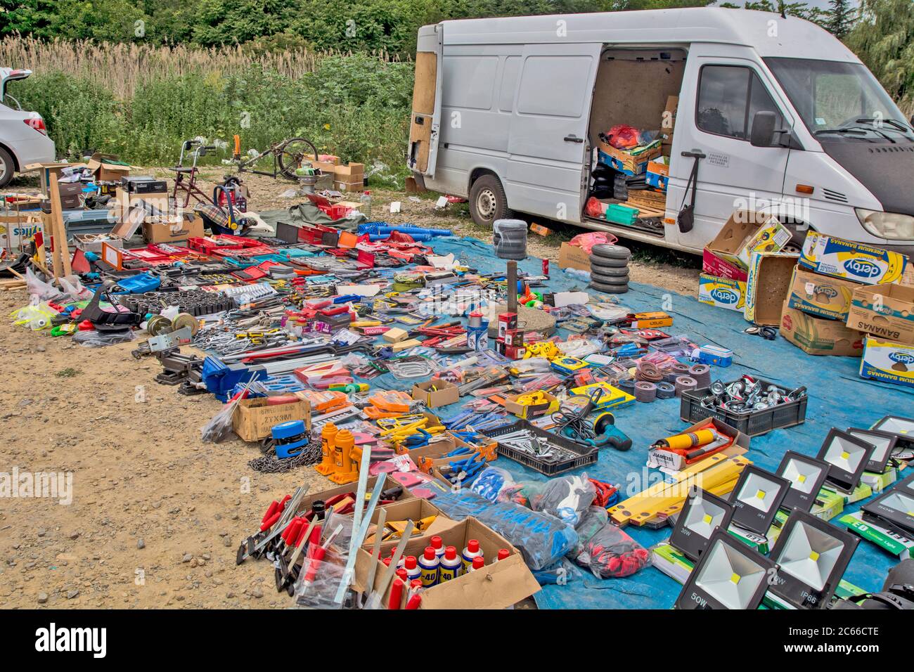 Zrenjanin, Serbia, July 4, 2020. Local flea market, market of everything and everything. The goods are on the counters and on the ground and the custo Stock Photo