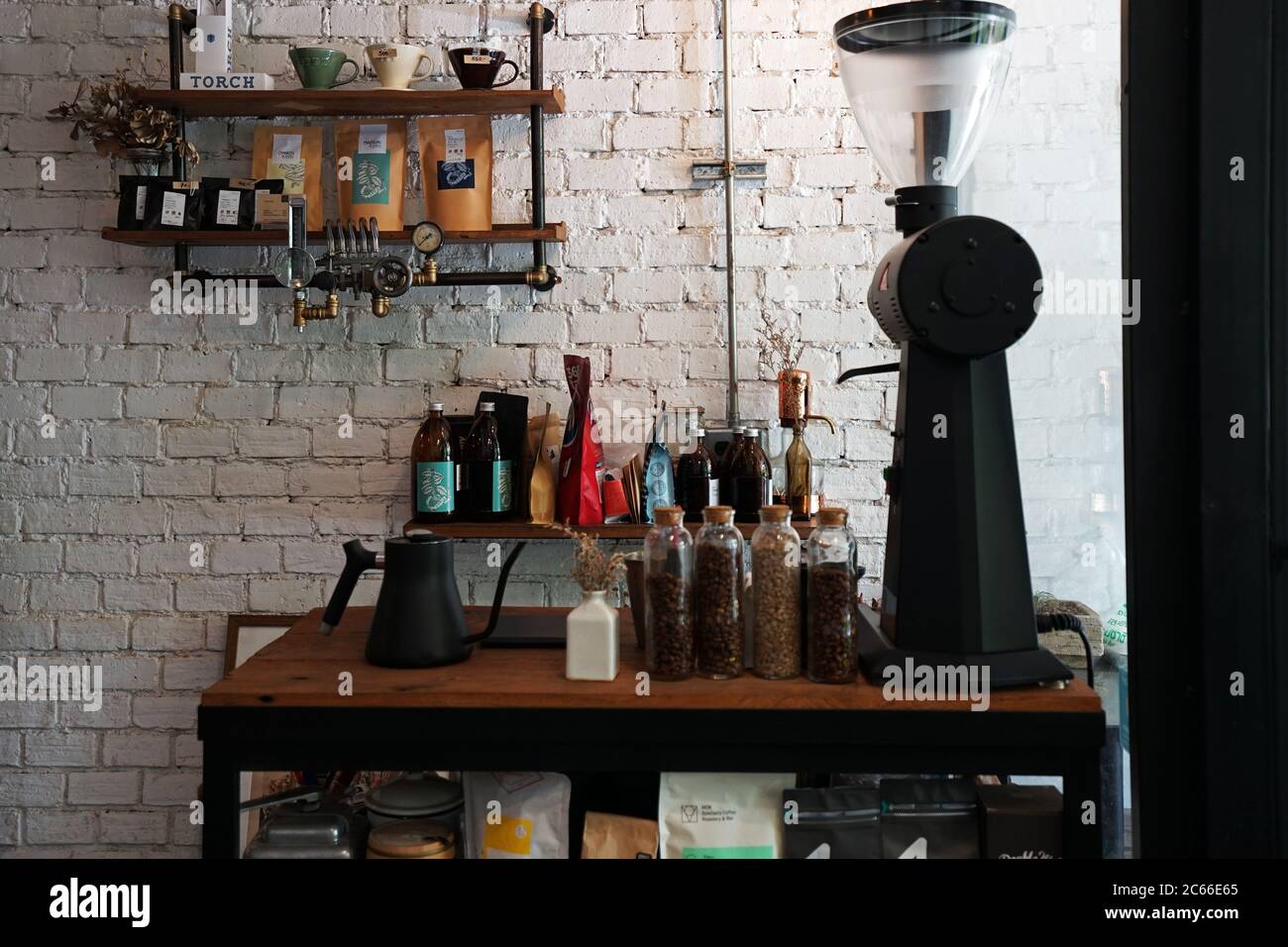 Interior design and decoration of coffee bar and bakery shop decorated with wooden furniture and