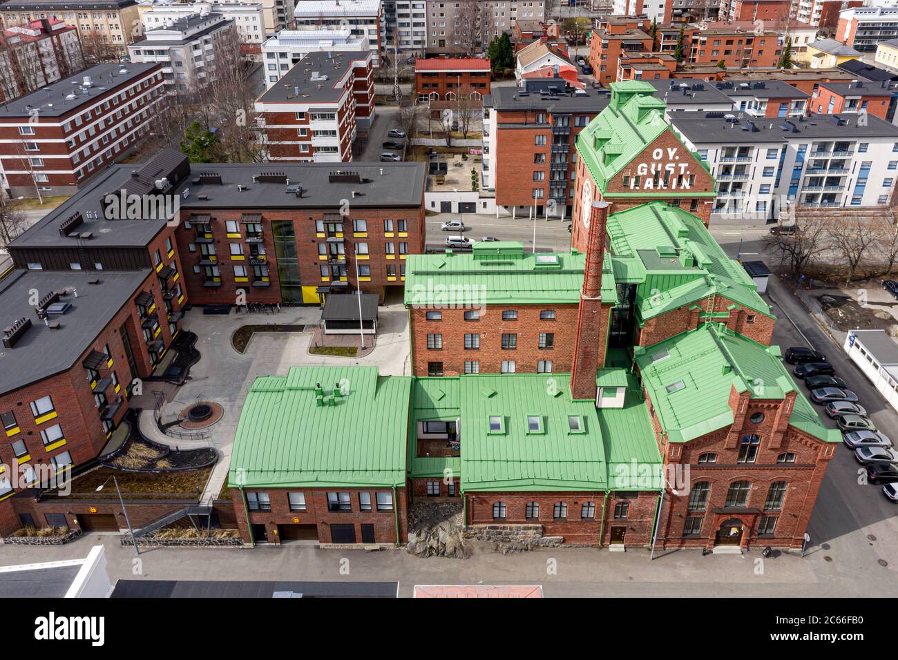 Kuopio, Finland April 28, 2020 Aerial view of the rebuilt old building of mill to the modern