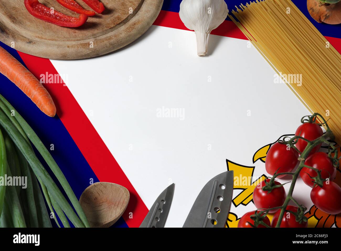 American Samoa flag on fresh vegetables and knife concept wooden table. Cooking concept with preparing background theme. Stock Photo
