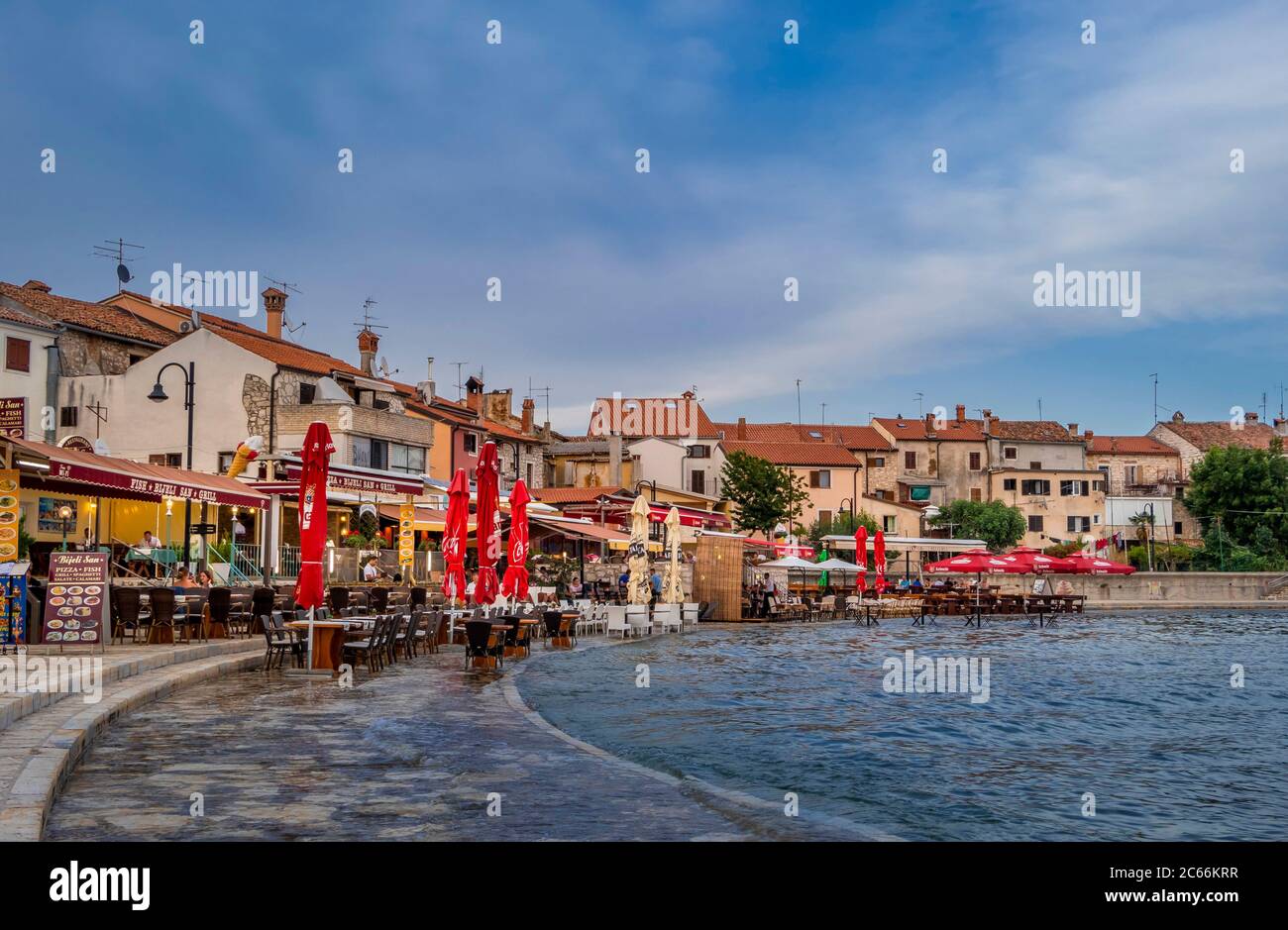 Seaside restaurants at high tide, Umag, Istria, Croatia, Europe Stock