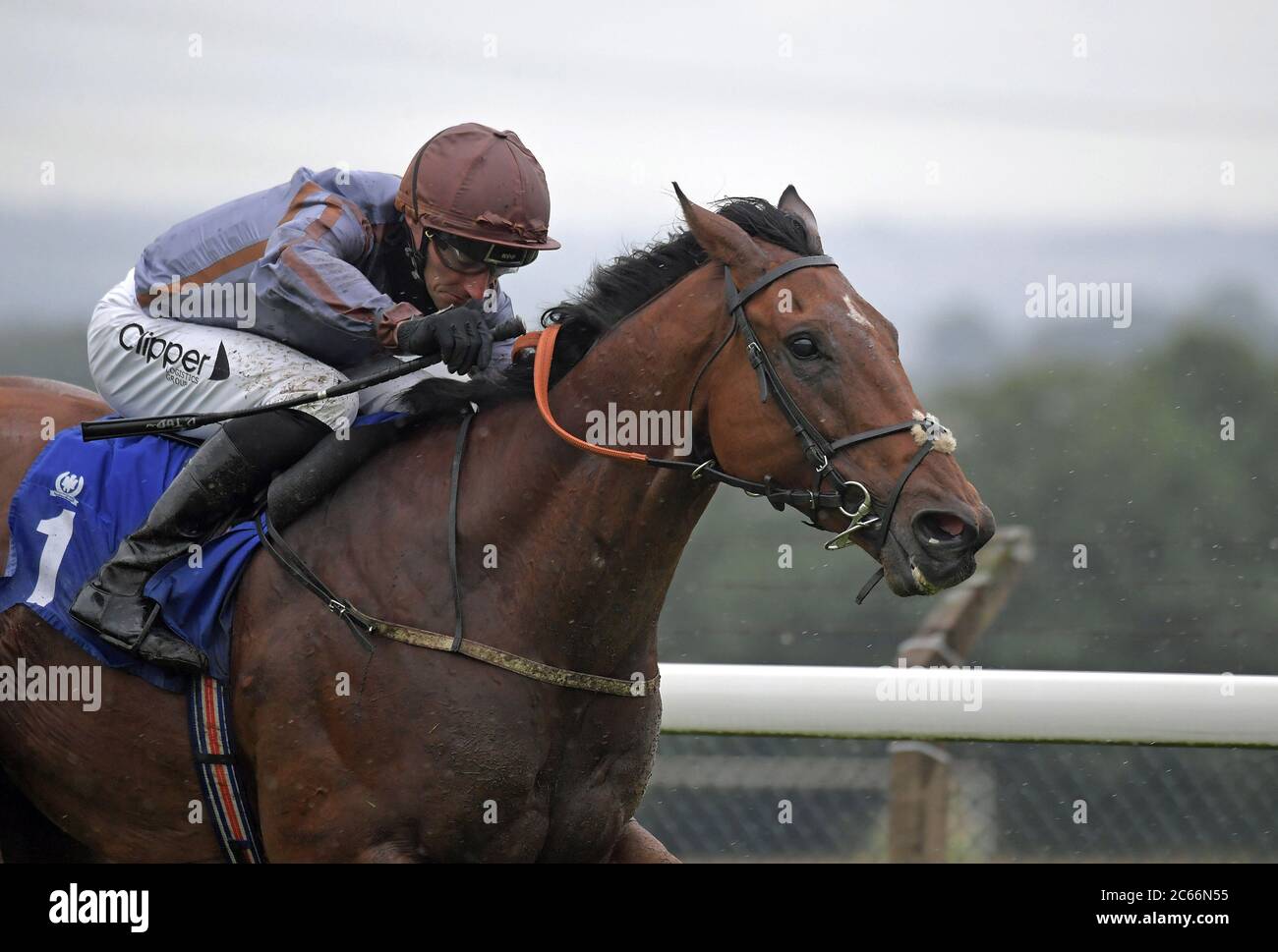 Summerghand ridden by Daniel Tudhope wins the King Richard 111 Handicap Stakes at Pontefract Racecourse. Stock Photo