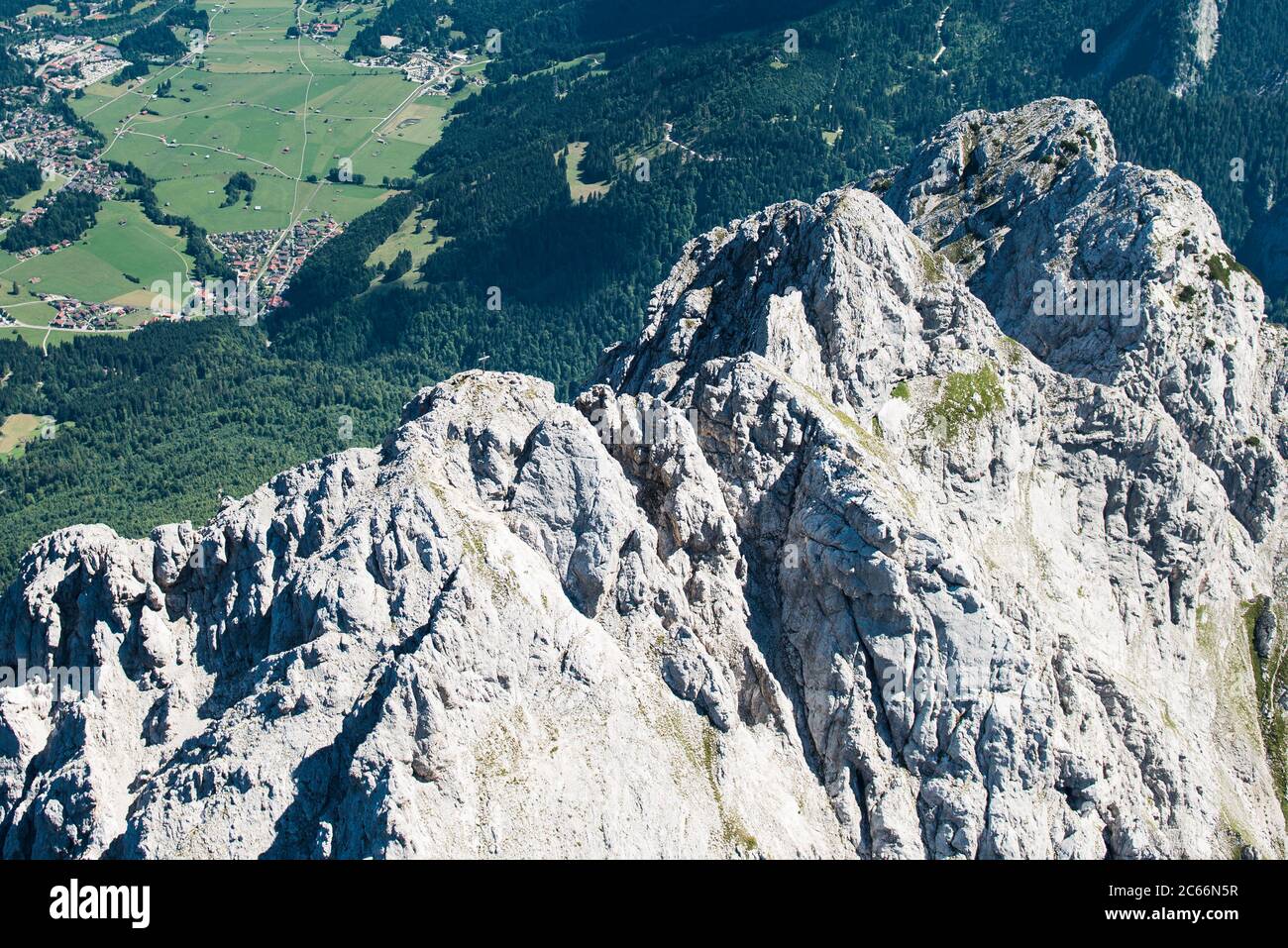 Waxenstein Peaks, village of Hammersbach near Grainau in the background, aerial photograph, Garmisch-Partenkirchen, Bavaria, Germany Stock Photo