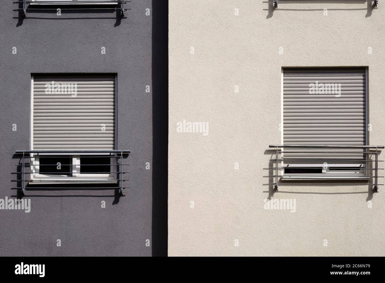 The modern facade of a modern residential building with windows and blinds, Stock Photo