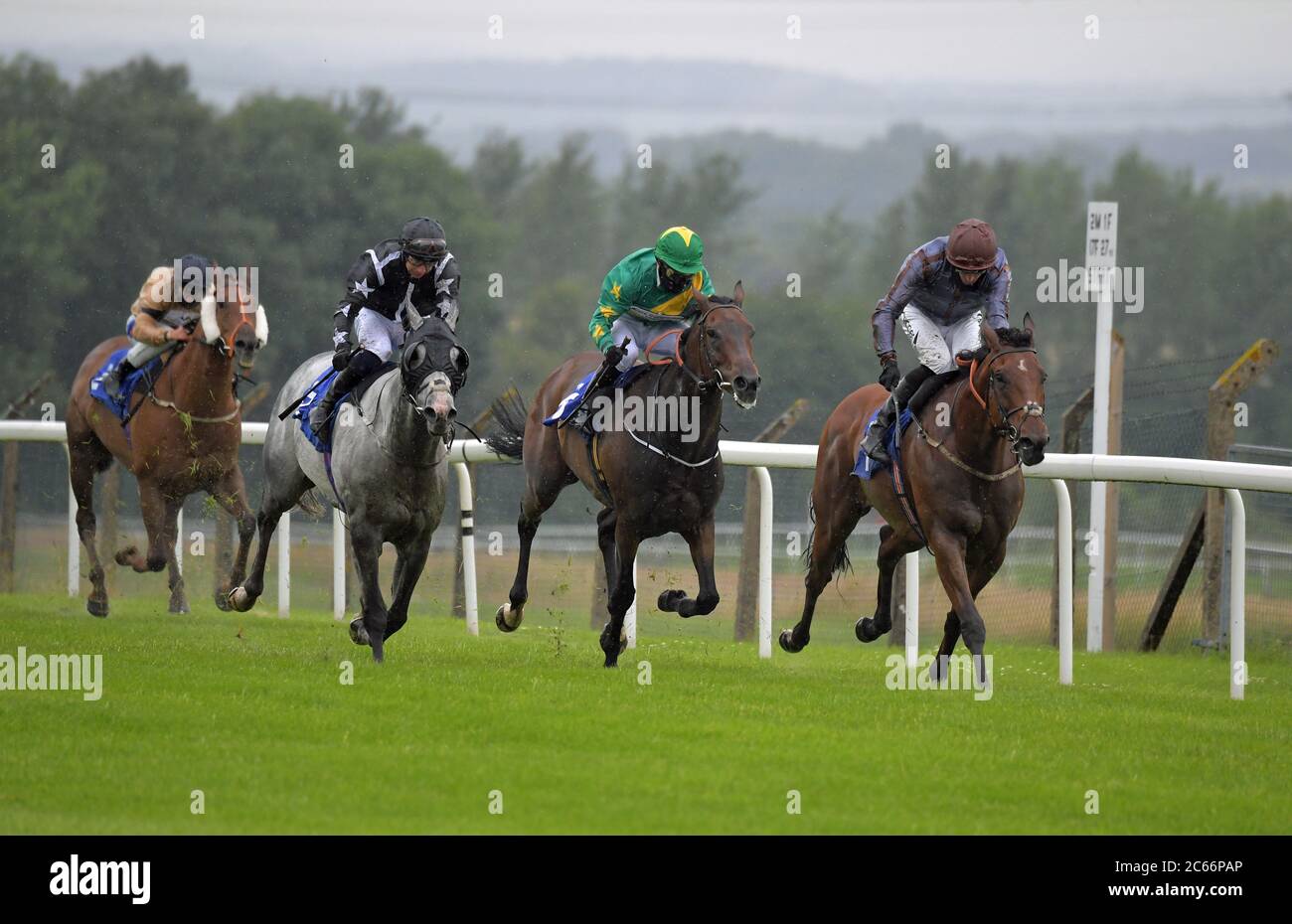 Summerghand ridden by Daniel Tudhope (right) wins the King Richard 111 Hhandicap Stakes at Pontefract Racecourse. Stock Photo