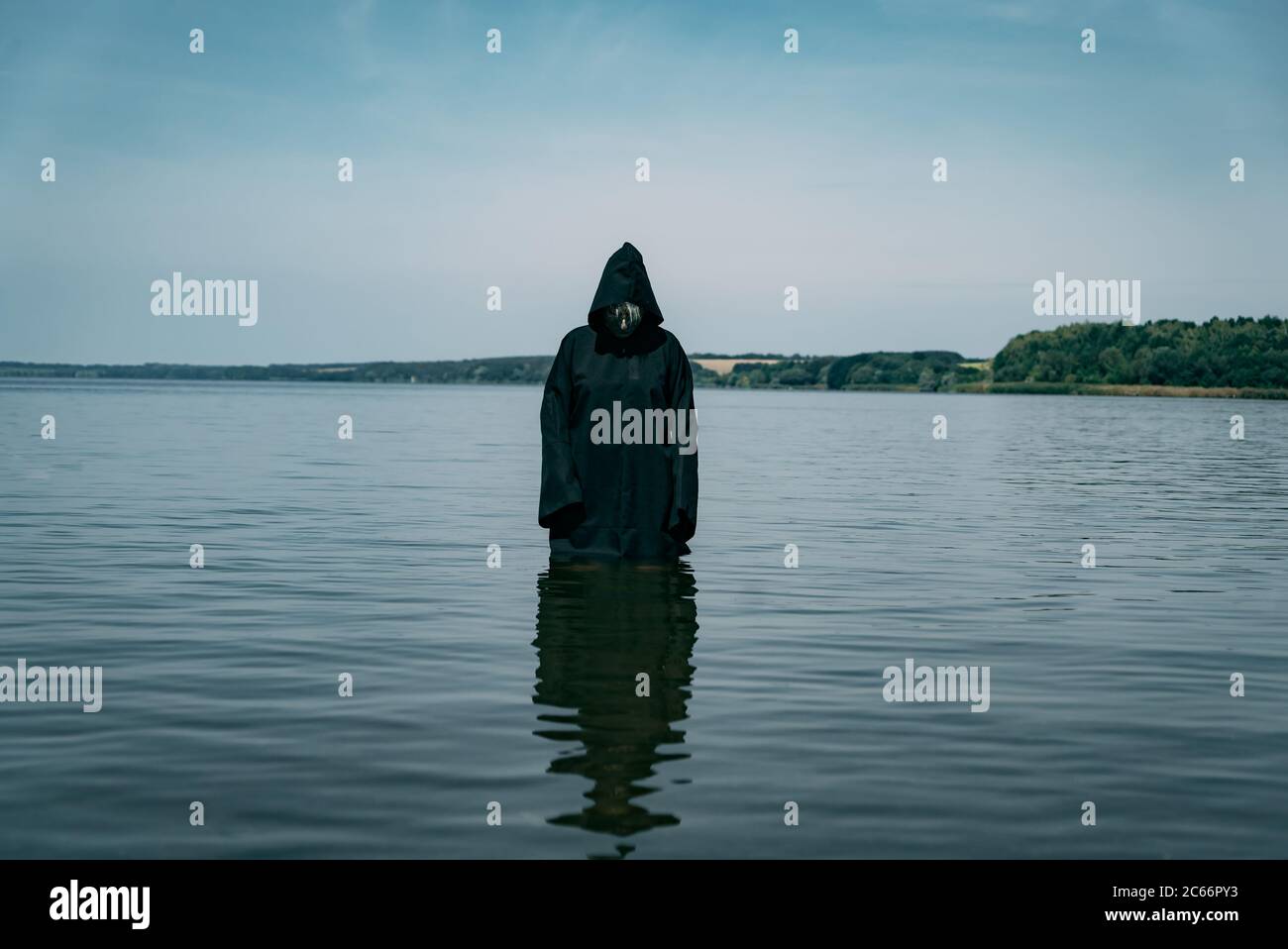 Black cloak hi-res stock photography and images - Alamy