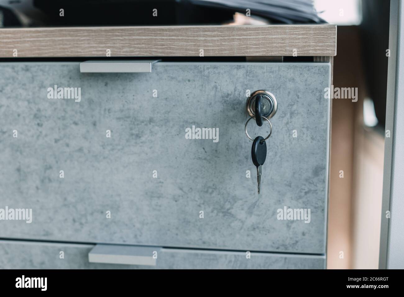 Locked desk locker in a modern office. security concept Stock Photo Alamy