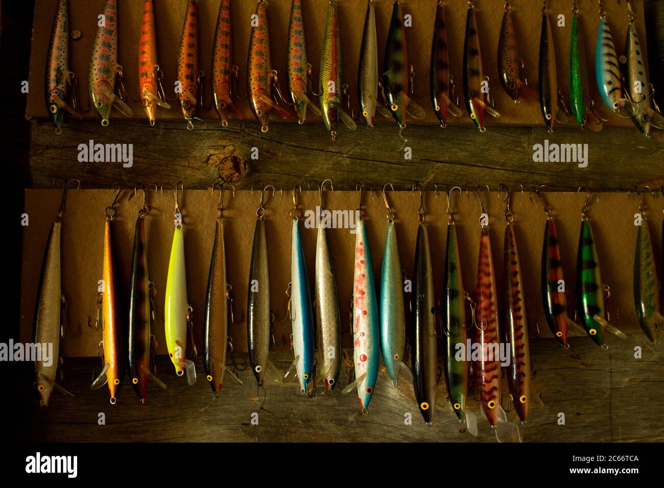 https://c8.alamy.com/comp/2C66TCA/colorful-fishing-lures-hanging-on-wall-lapland-finland-2C66TCA.jpg
