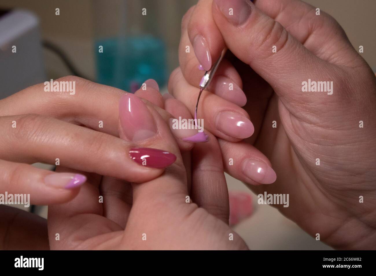 Female hands apply shellac hi-res stock photography and images - Alamy