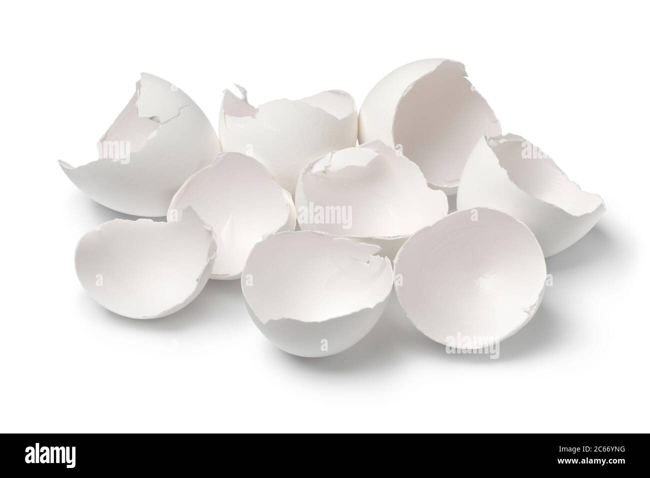 White broken egg shells close up on white background Stock Photo
