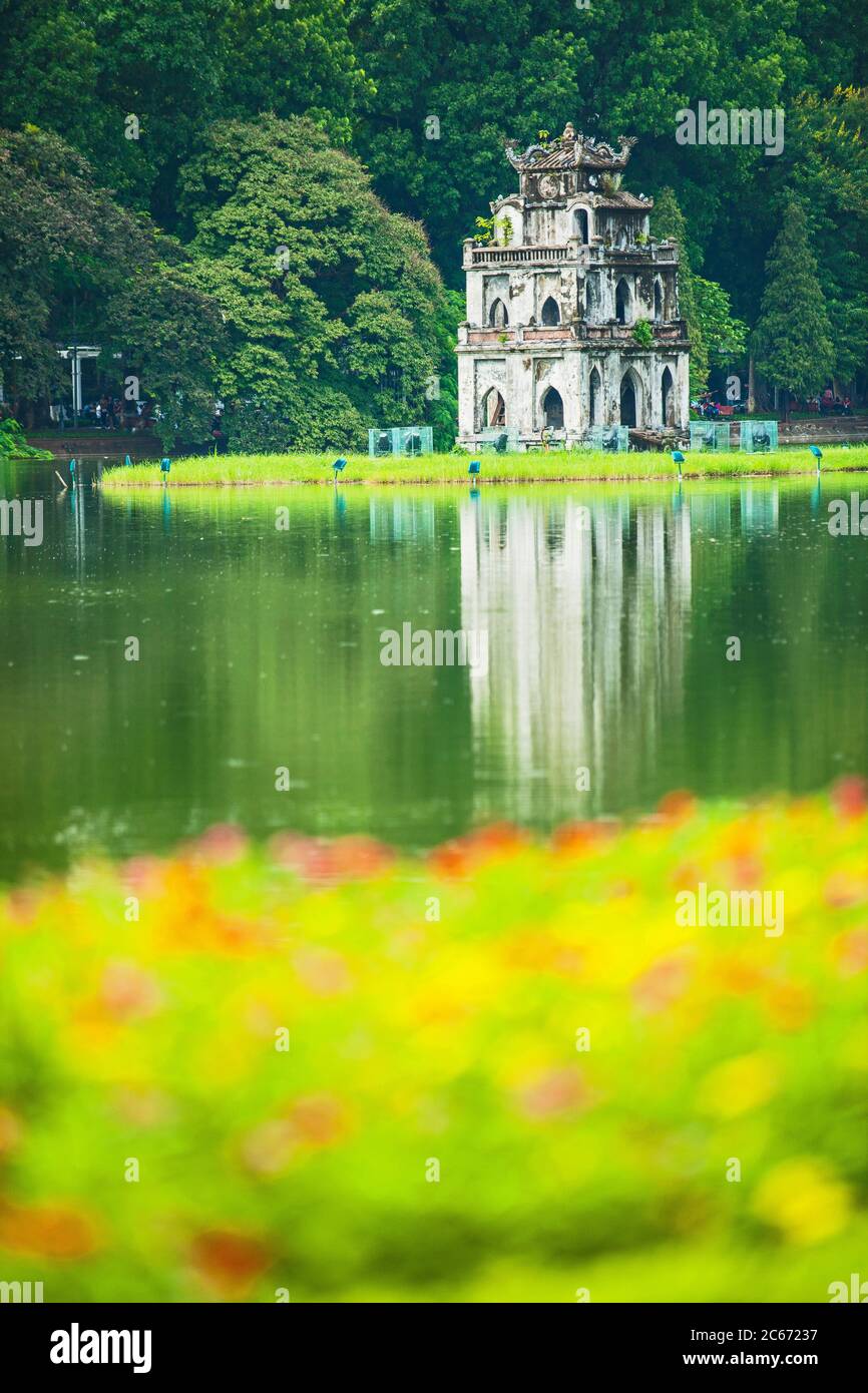 The iconic turtle tower in Hoan Kiem Lake in Hanoi Stock Photo