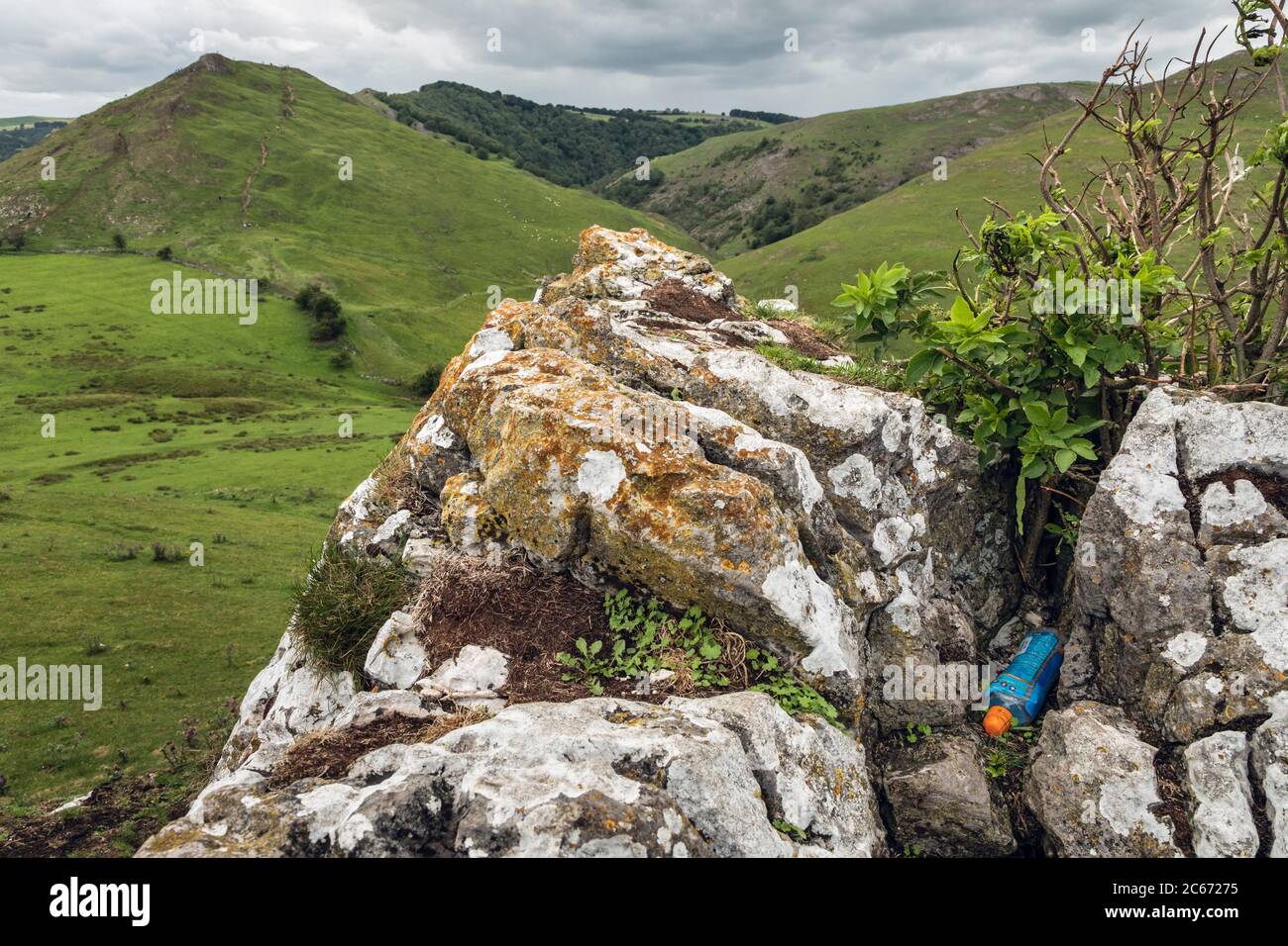 An empty plastic drink bottle discarded on Hamston Hill, Dovedale, Peak District NationalPark, Derbyshire Stock Photo