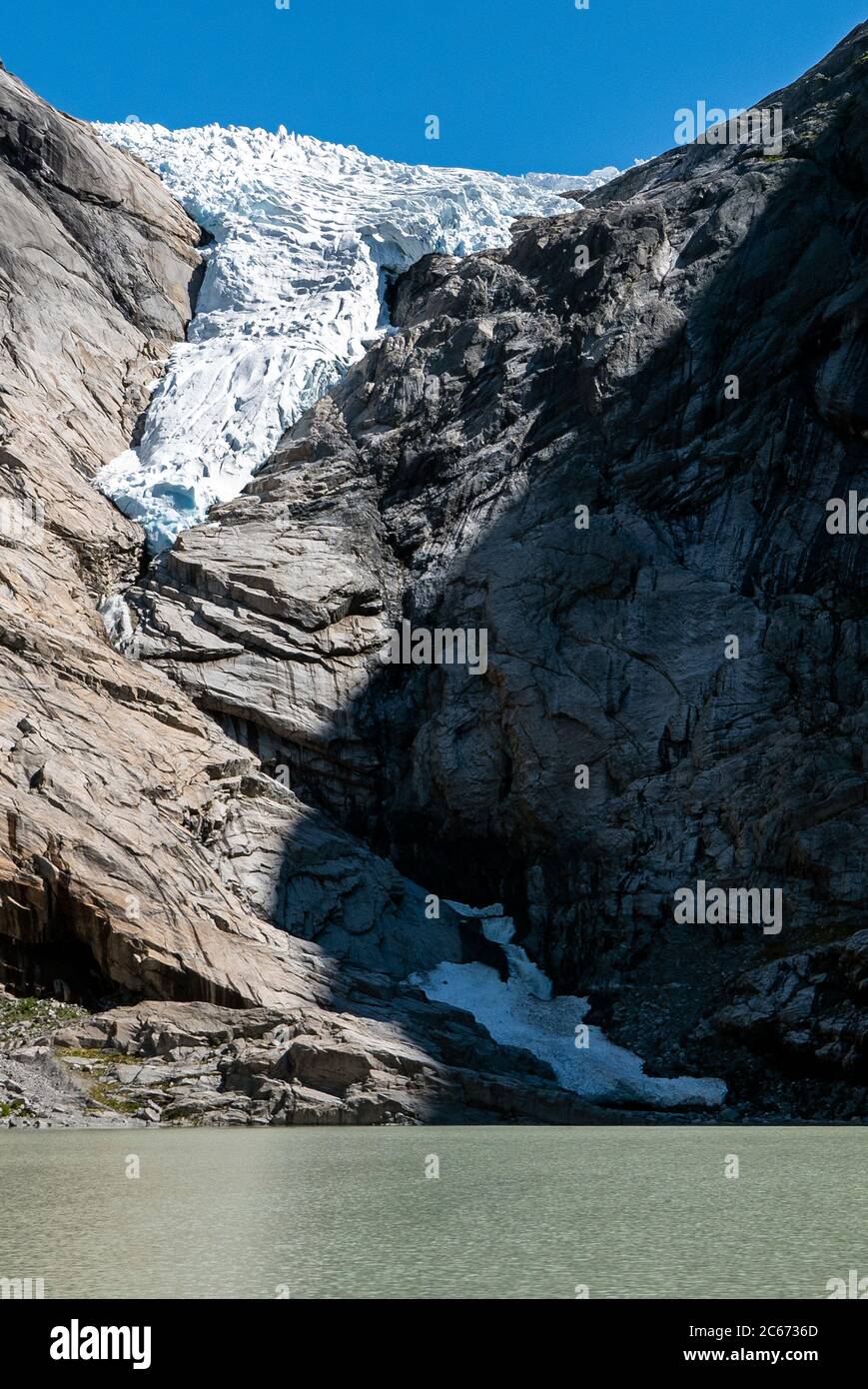 Briksdalsbreen/The Briksdal Glacier, Nordfjord, Norway (July 2020) is a branch of Jostedalsbreen. Last winter there fell 7 metres snow on top of it Stock Photo