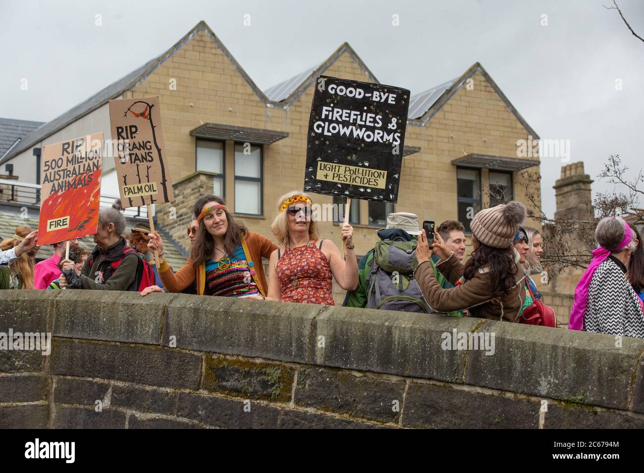 Extinction Rebellion flash mob in Hebden Bridge West Yorkshire perform Stayin' Alive in the town centre Stock Photo