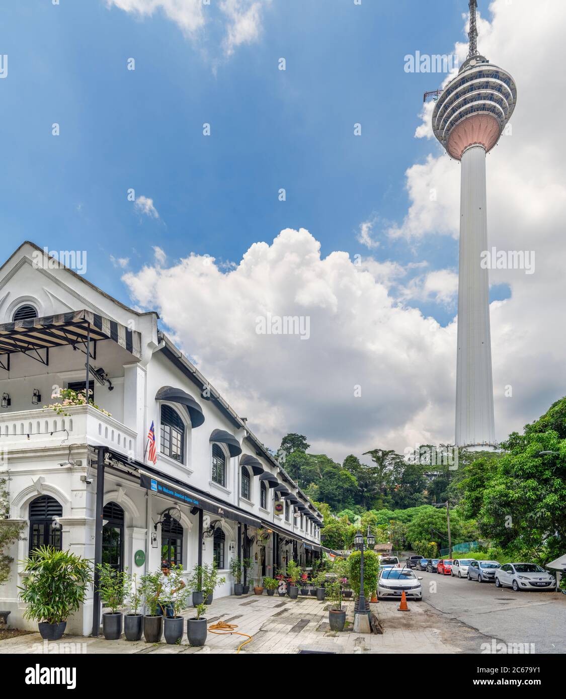 Restaurants in Old Malaya with the KL Tower (Menara Kuala Lumpur) behind, Kuala Lumpur, Malaysia Stock Photo