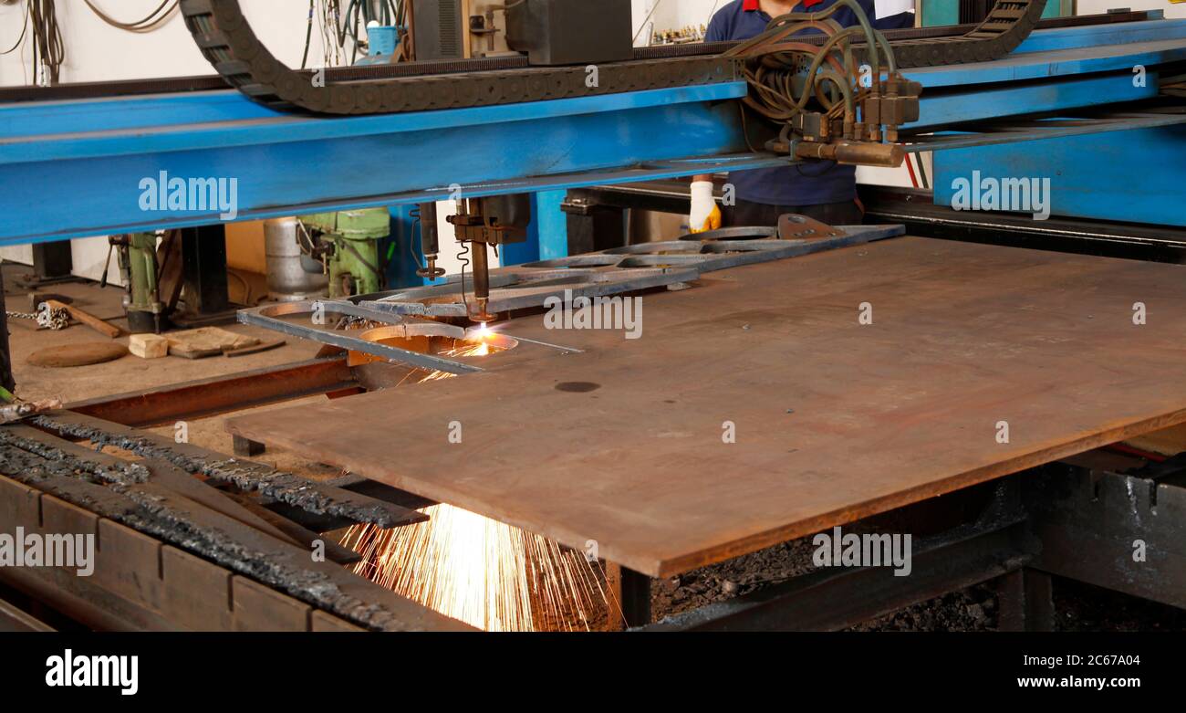 CNC laser cutting metal sheet Stock Photo - Alamy