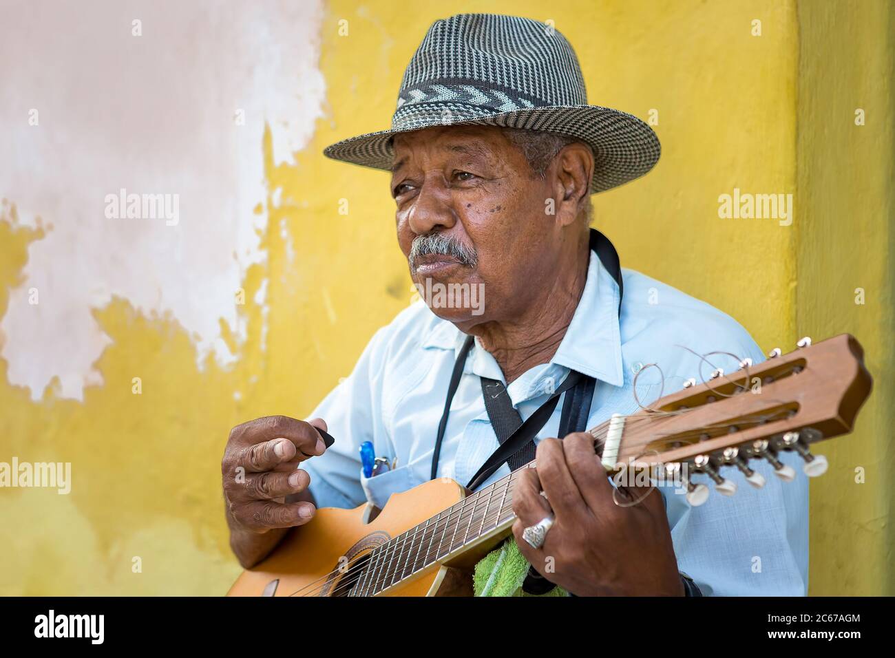 Elderly man playing traditional cuban music in Old Havana Stock Photo