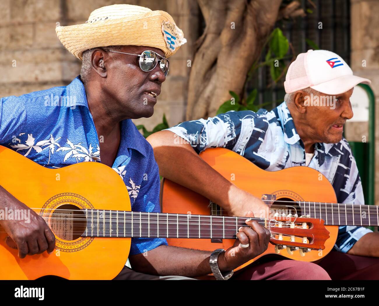 Traditional music group playing for tourists in Old Havana Stock Photo