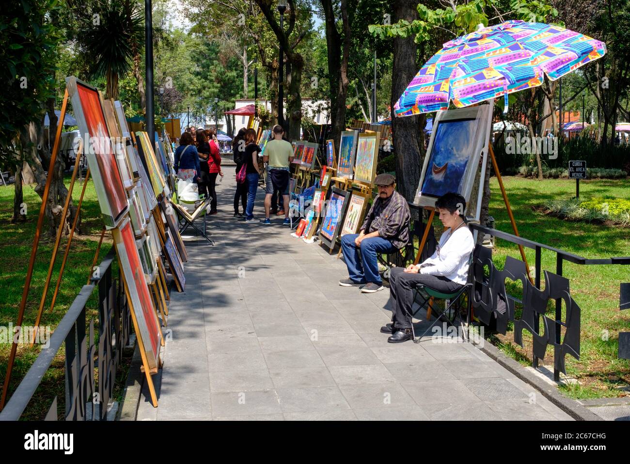 The famous Saturday Bazaar at the San Angel neighborhood selling paintings and traditional works of art Stock Photo