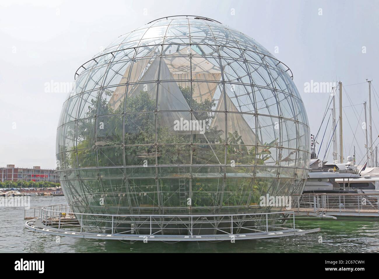 Genoa, Italy - July 14, 2013: Tropical Greenhouse Glass Sphere Biosphere Globe Docked at Port in Genoa, Italy. Stock Photo