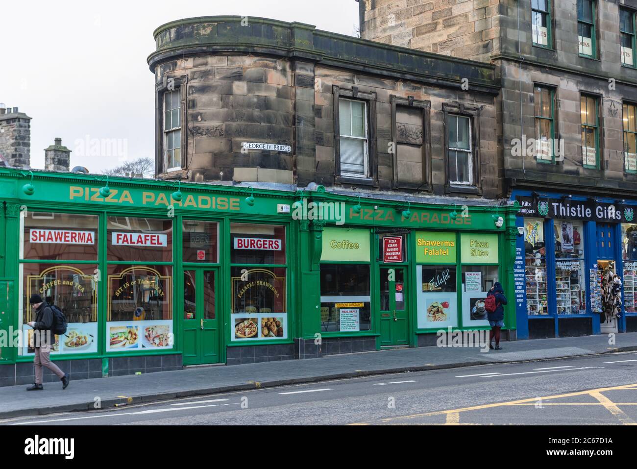 Pizza Paradise and Thistle Gifts shop on South Bridge street in Edinburgh, the capital of Scotland, part of United Kingdom Stock Photo