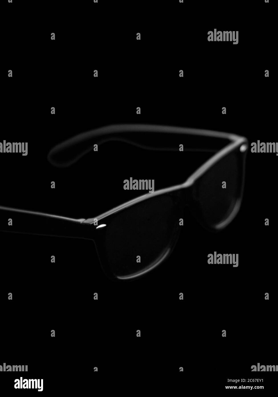 Black sunglasses on the black background Stock Photo Alamy