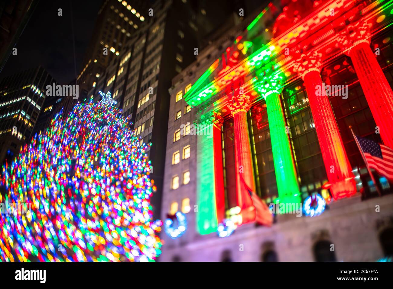 Big Christmas tree glows in at front of New York Stock Exchange