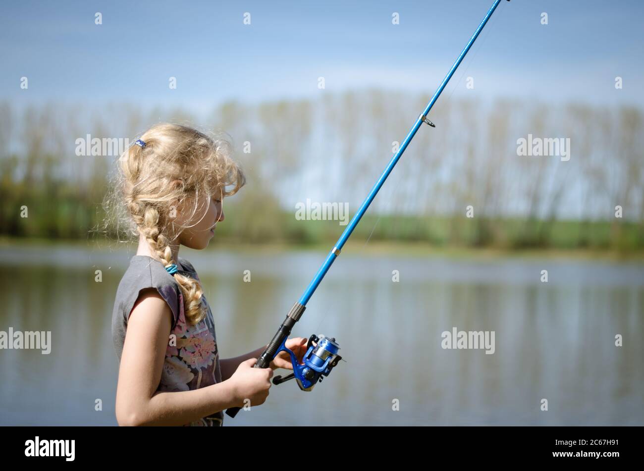 Child fishing rod fish hi-res stock photography and images - Page 4 - Alamy