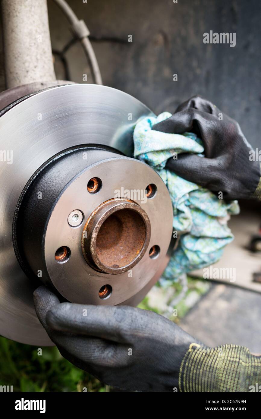 Cleaning of car disc brake system Stock Photo Alamy