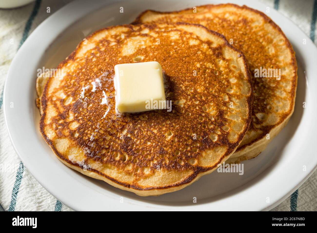 Homemade Warm Buttermilk Pancakes with Butter and Syrup Stock Photo Alamy