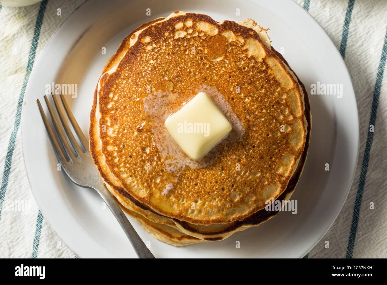 Homemade Warm Buttermilk Pancakes with Butter and Syrup Stock Photo Alamy