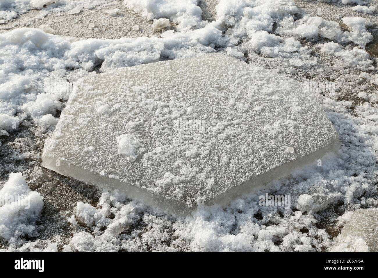 ice hexagon on the beach of river Elbe Stock Photo