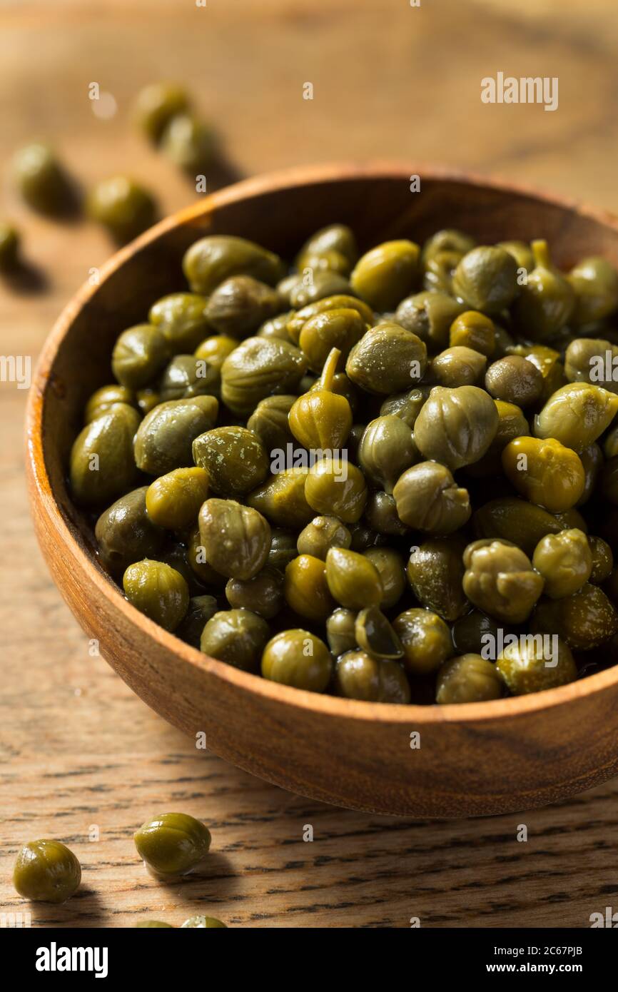 Organic Pickled Canned Capers in a Bowl Stock Photo