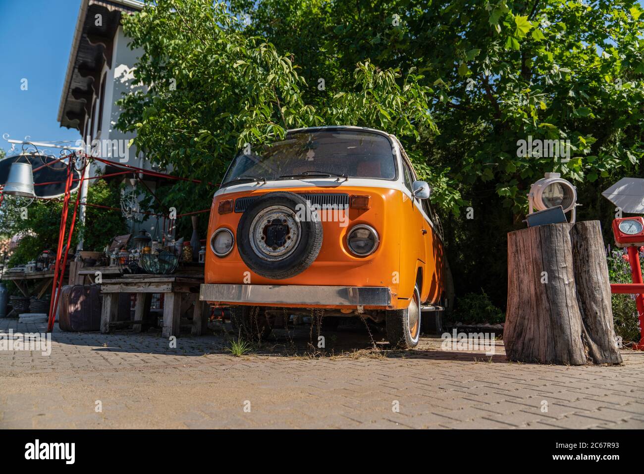 Ankara/Turkey- July 05 2020: Old orange Volkswagen van parked in the garden Stock Photo