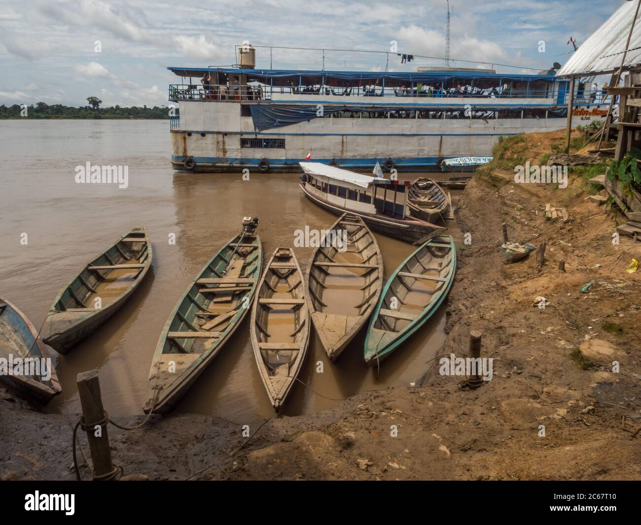 Santa Rosa, Peru - December 12, 2019: Wooden boats and cargo boot in the  port of Amazon river. South America. Amazon River. Tres fronteras. Rain Fo  Stock Photo - Alamy