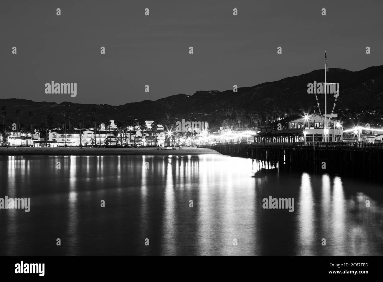 Illuminated Santa Barbara Pier at night, California, USA Stock Photo