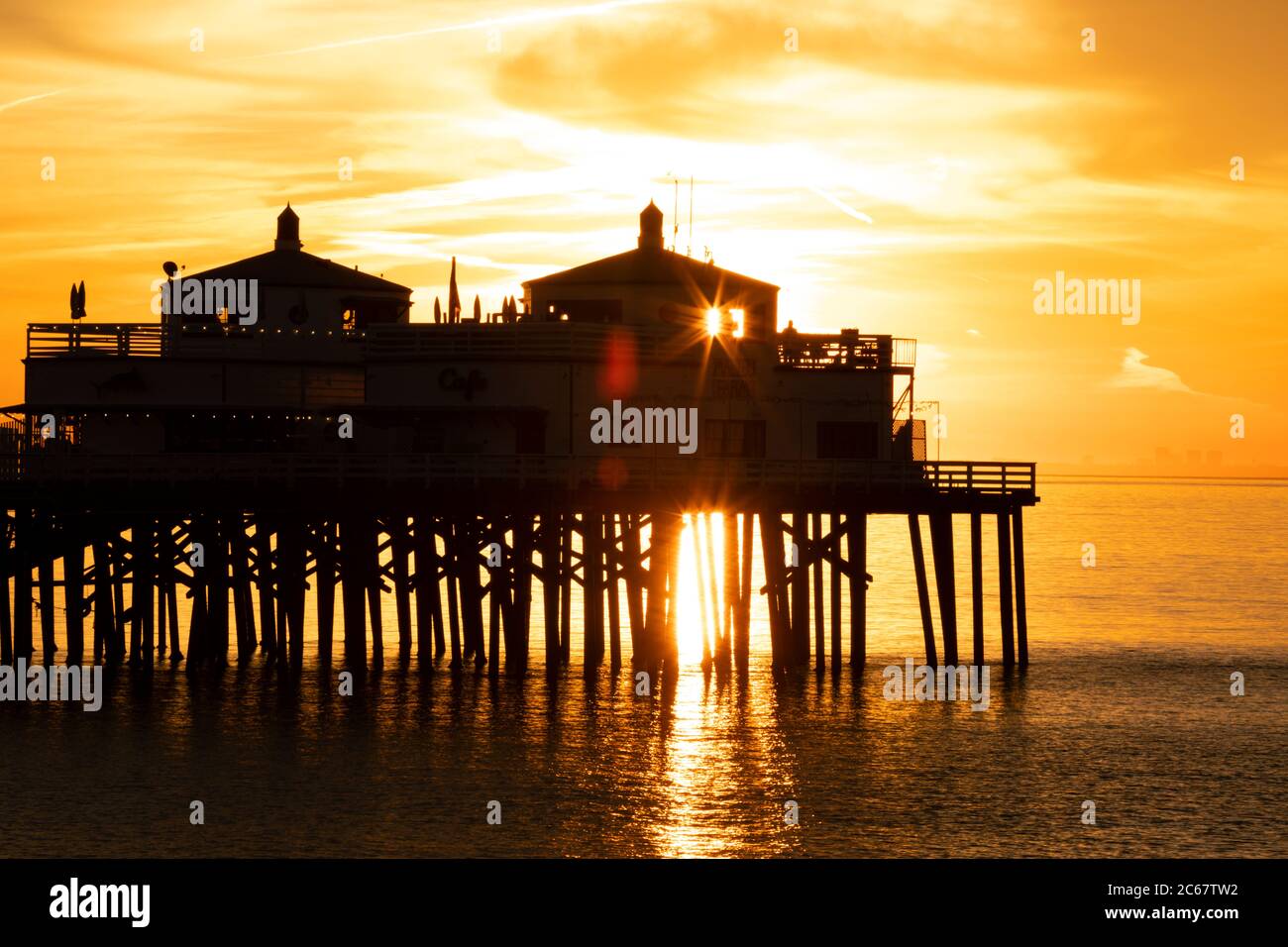 Silhouette of Malibu Beach Pier at sunset, California, USA Stock Photo
