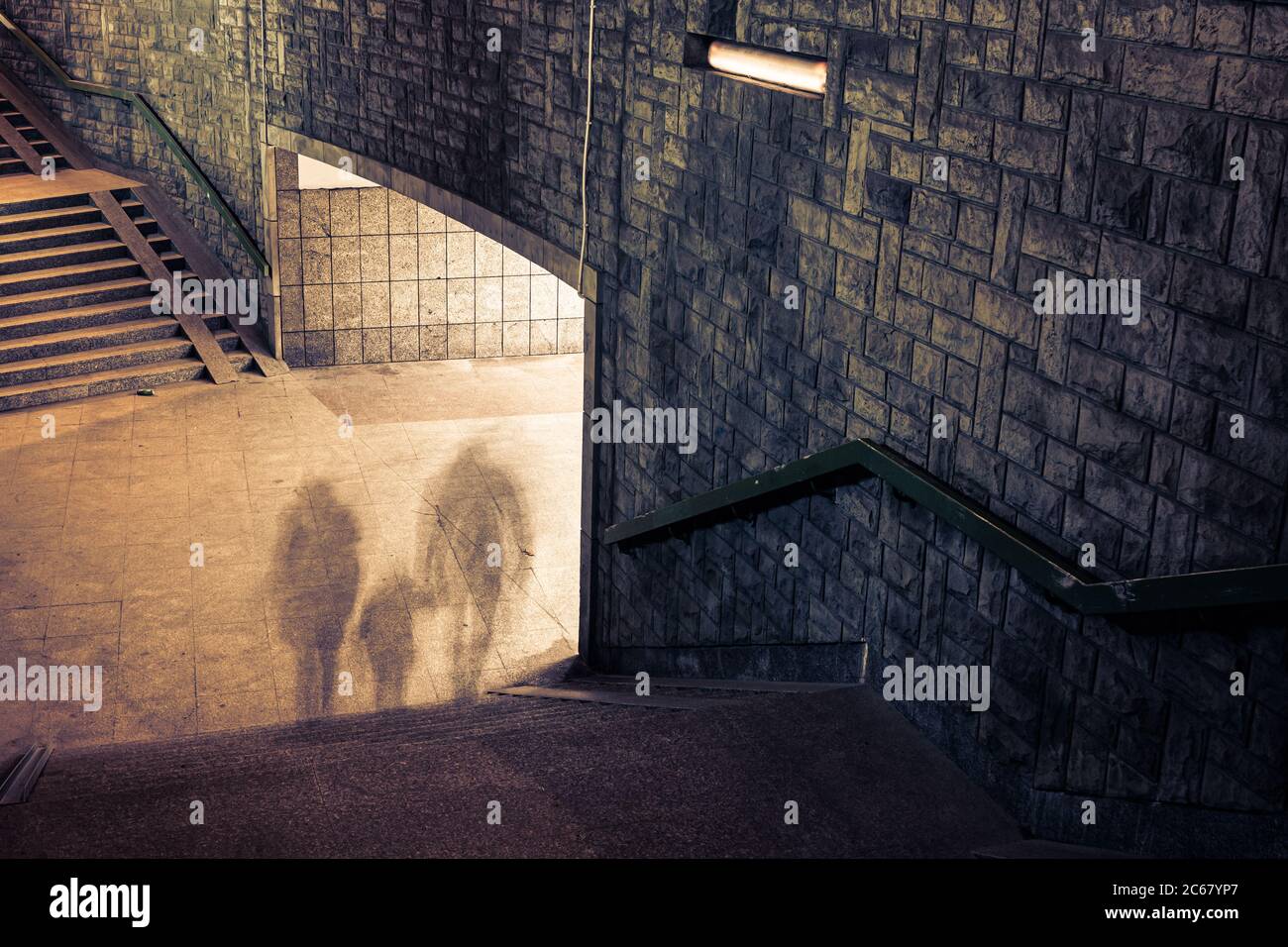Ghosts of people travelling from tunnel Stock Photo