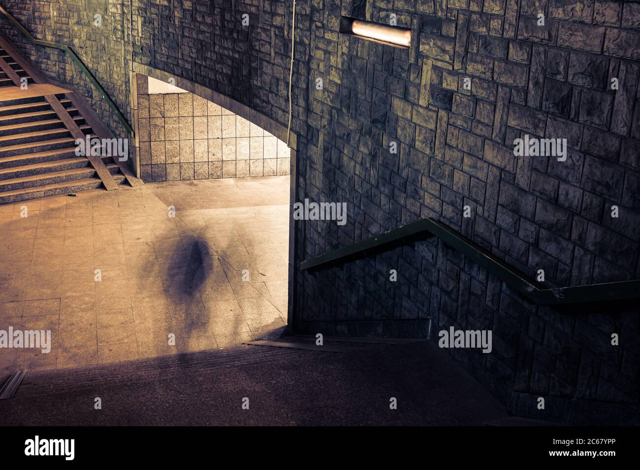 Ghosts of people travelling from tunnel Stock Photo