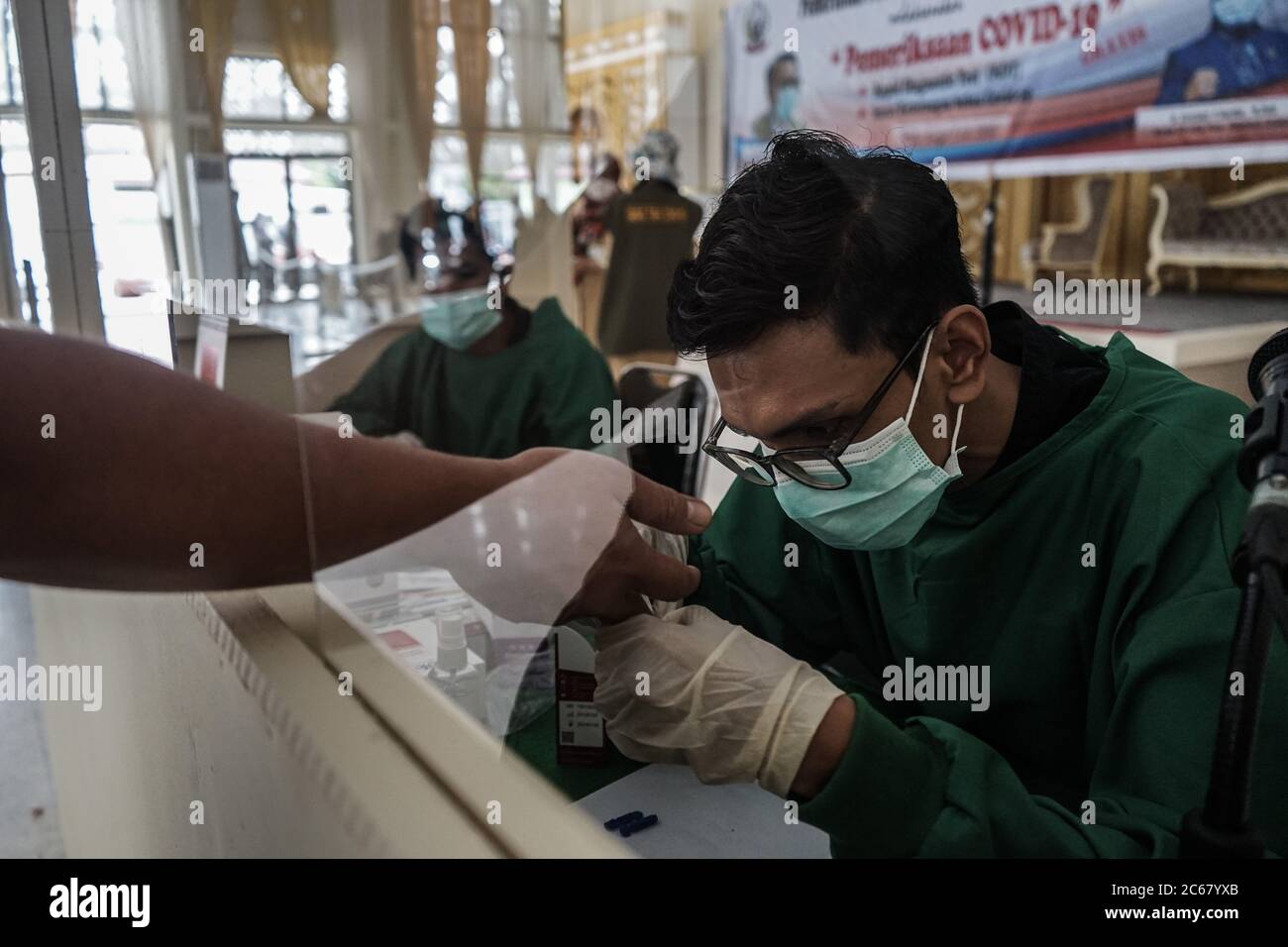 Free rapid test examination conducted by Makassar city residents Stock Photo Alamy