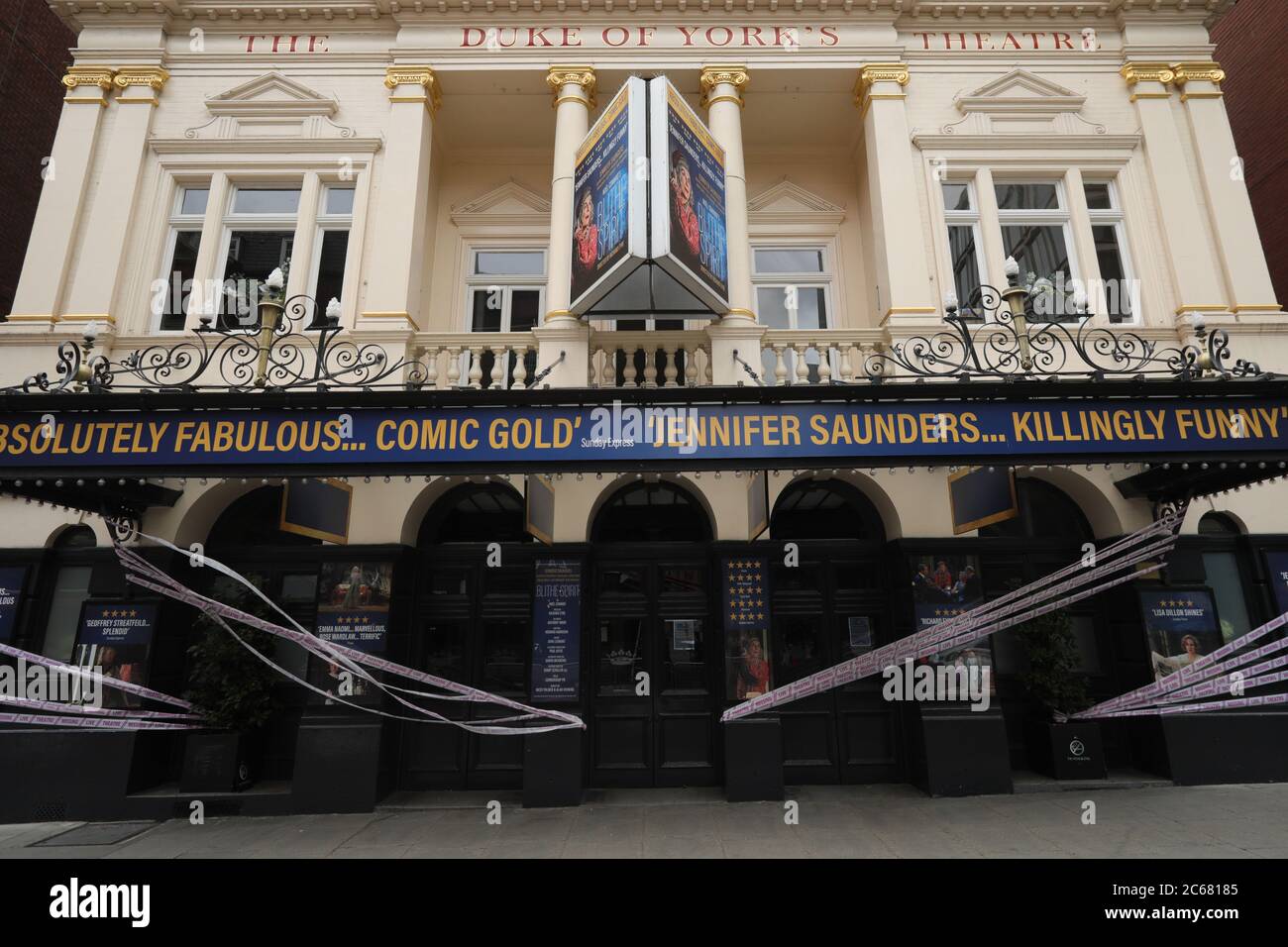 London, UK. 7th July, 2020. Photo taken on July 7, 2020 shows the Duke of York's Theater wrapped with tapes in London, Britain. Britain's arts, culture and heritage industries will receive a 1.57-billion-pound (1.96-billion-U.S. dollar) rescue package to help weather the impact of the coronavirus pandemic, the government has announced. Credit: Tim Ireland/Xinhua/Alamy Live News Stock Photo