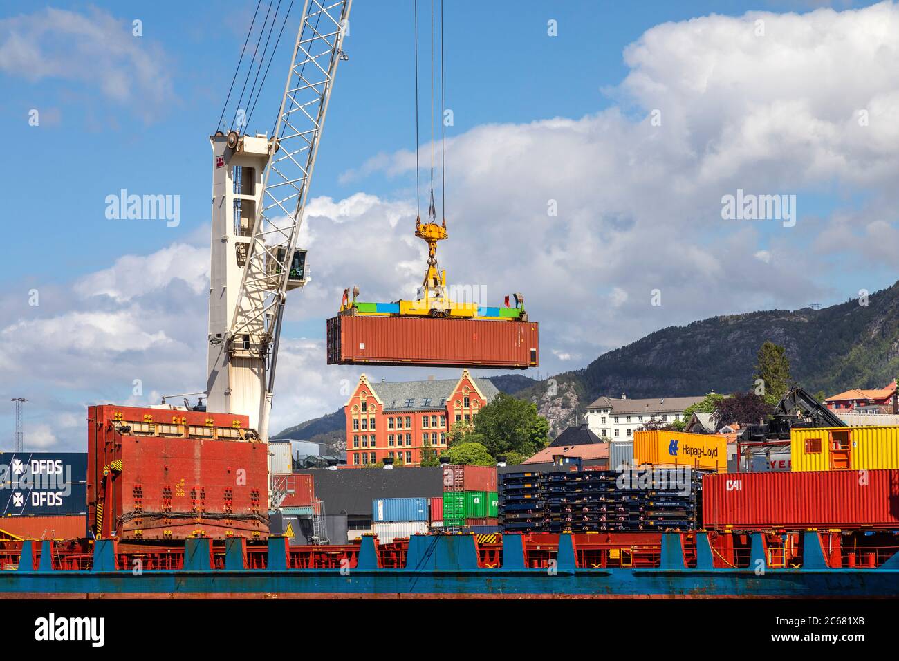 Container loading operation at Frieleneskaien quay, in the port of Bergen, Norway. Stock Photo