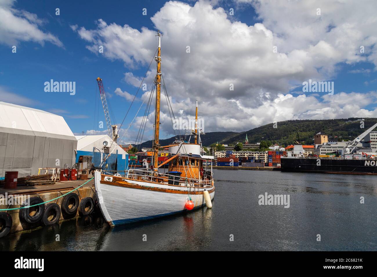 Veteran pilot vessel, now a sightseeing and pleasure vessel, Hardsjoe (Hardsjø) built 1952,  moored at a ship repair yard at Laksevaag, in the port of Stock Photo