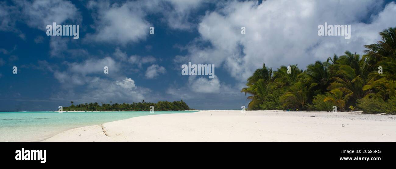 View of beach and palm trees, Aitutaki Lagoon, Aitutaki, Cook Islands Stock Photo
