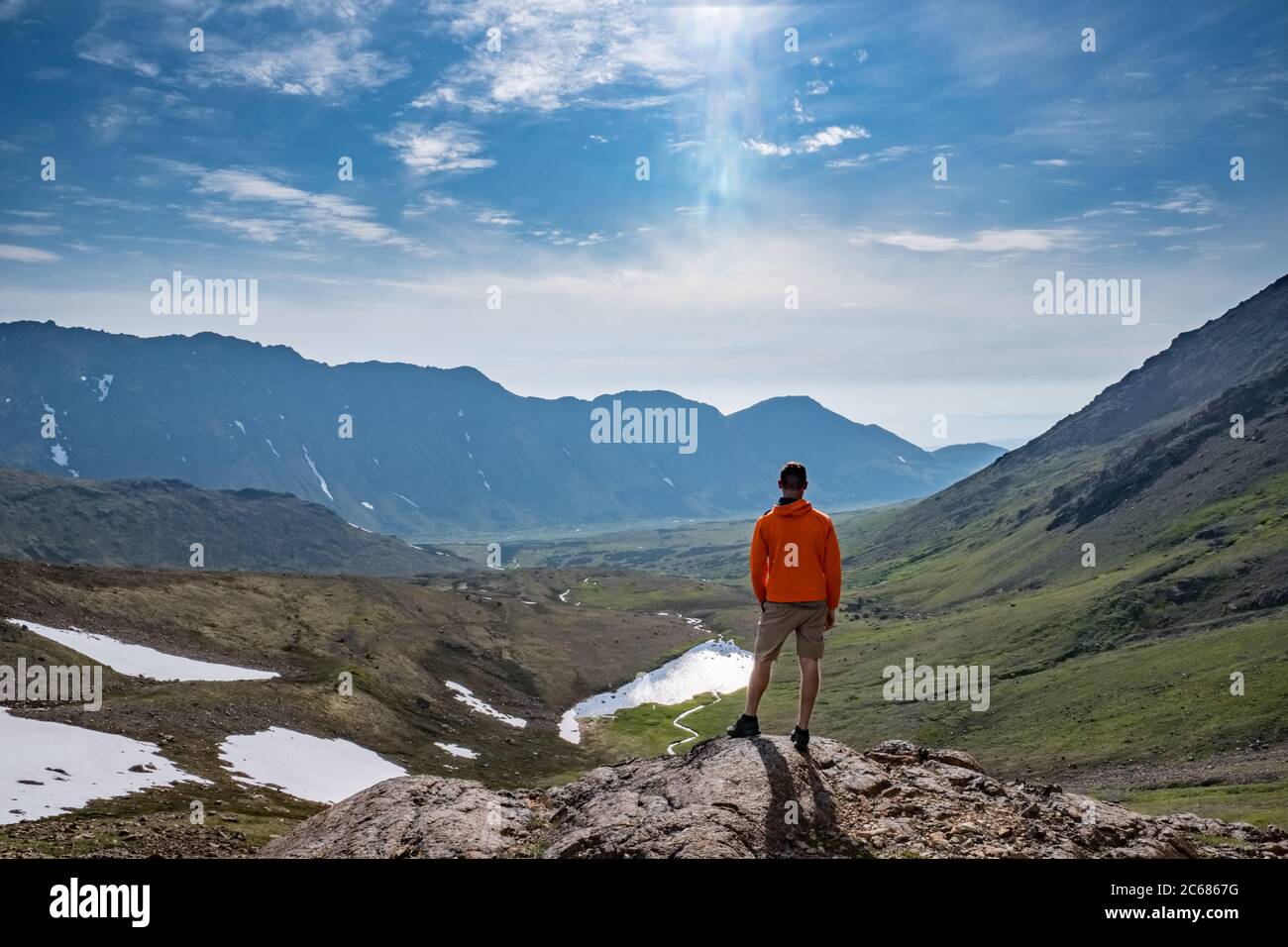 Alaskan summers, when you need shorts and a hoody Stock Photo