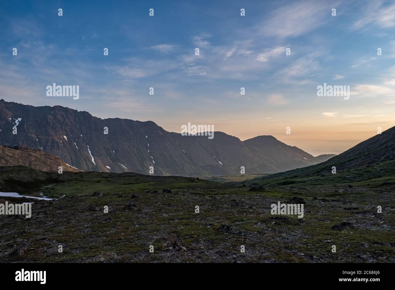 Peaceful glacial valley shot during evening Stock Photo