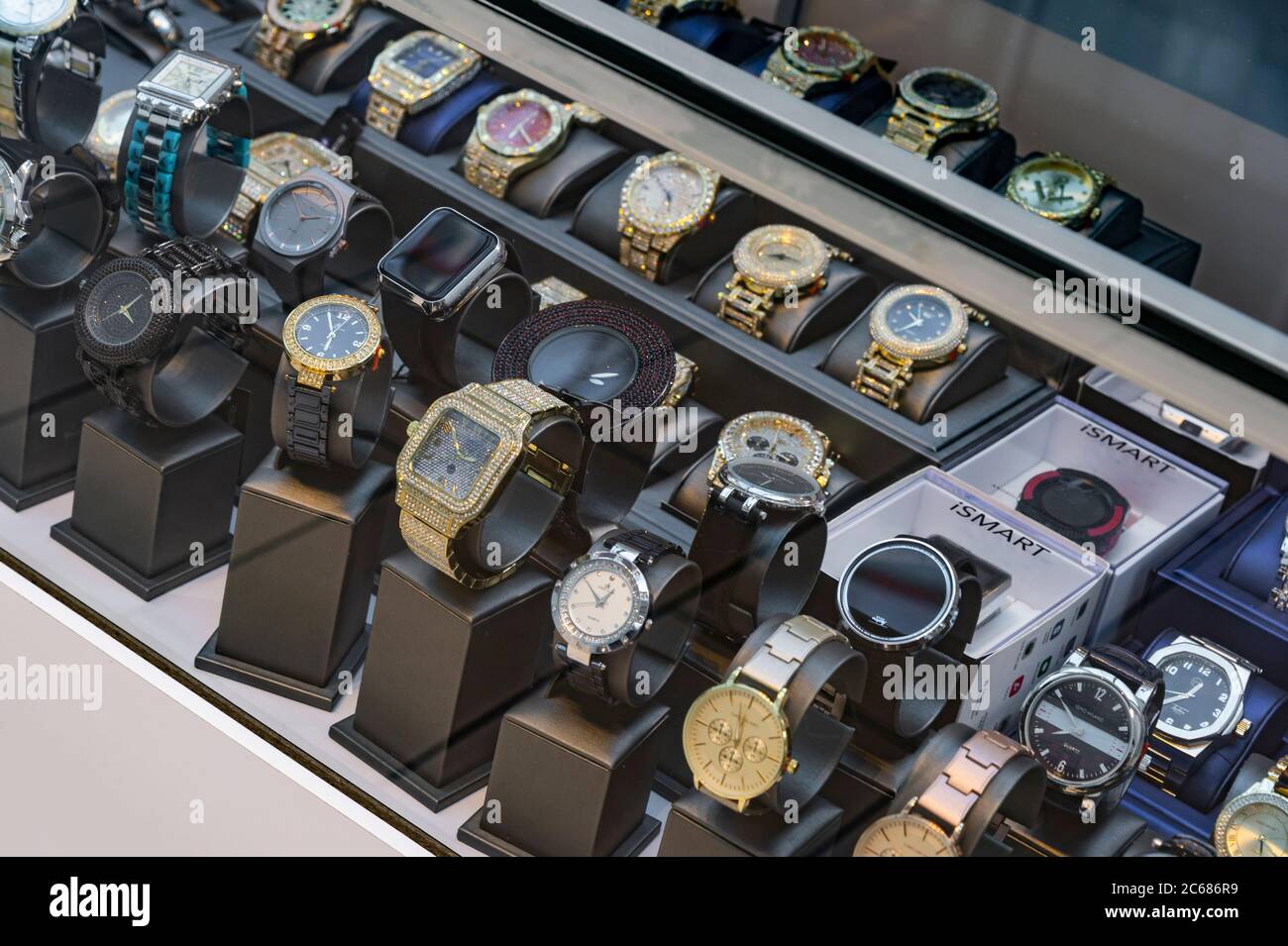 Watches for sale in display case in mall, Philadelphia, USA Stock Photo