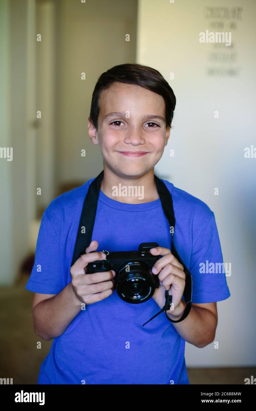 Preteen boy smiling camera hi-res stock photography and images - Alamy