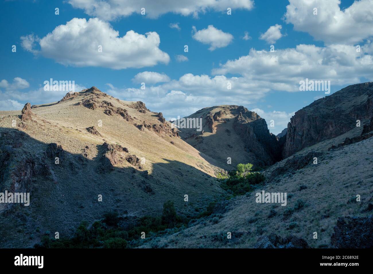 Rock formations with sage brush Stock Photo